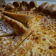 Illustration for article titled Pizza Huts Hot Dog Bites Crust Pizza: The Snacktaku Review